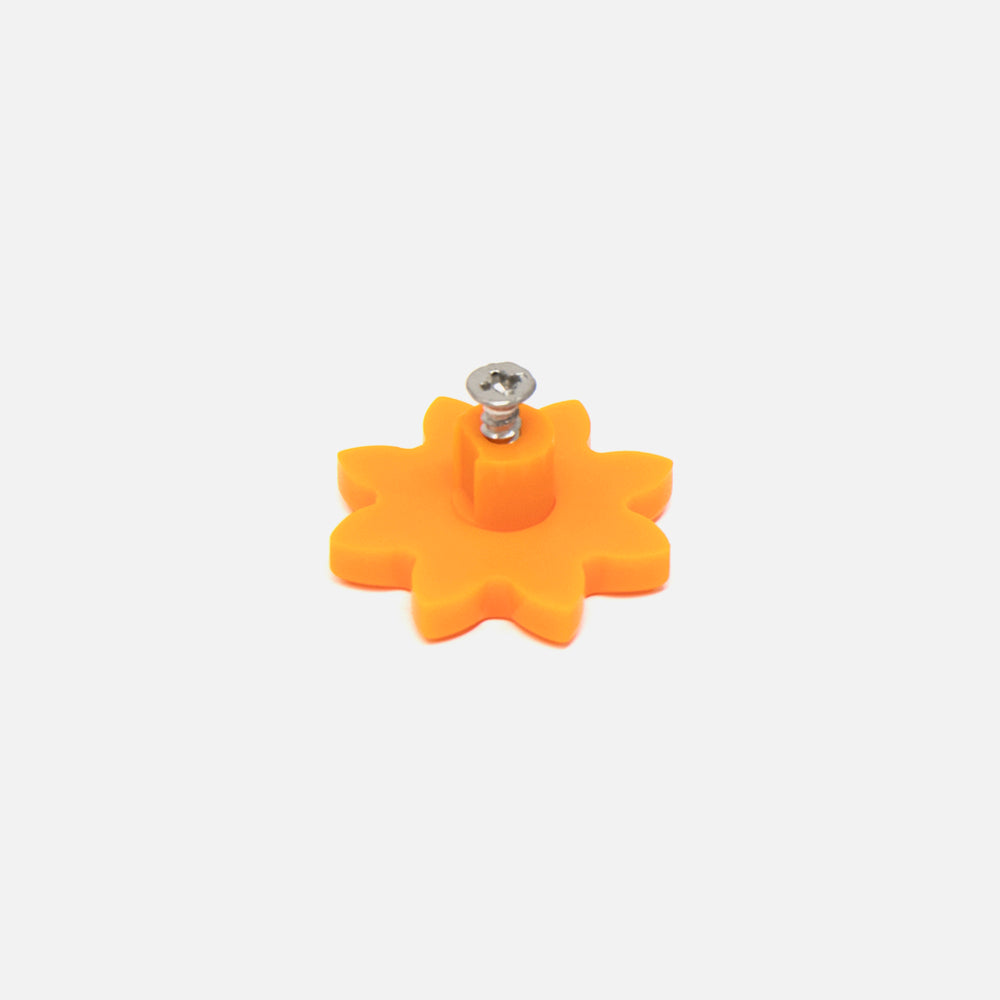 A Fridja f1900 Orange Gear Cog: an orange, flower-shaped plastic knob with a central metal screw, shown on a plain white background—perfect as a juicer component or replacement gear cog.