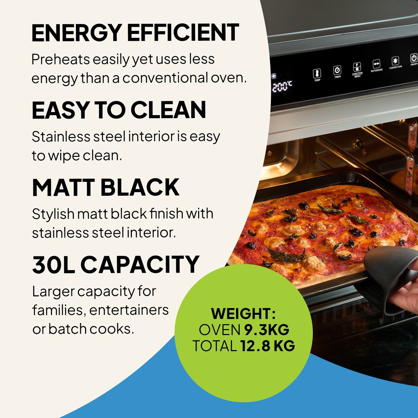 A person pulls a tray of pizza from the Fridja f77 Super Oven Pro - 30L Digital Air Fryer Oven. Features: PFAS free, energy efficient, easy-clean stainless steel, matt black finish, 9.3kg oven weight, 12.8kg total weight.