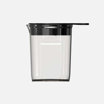 The Fridja f2500 Pulp Sieve Filter is shown against a plain white background. This transparent juicing accessory features a black lid, spout, and handle with side measurement markings for precise pouring.