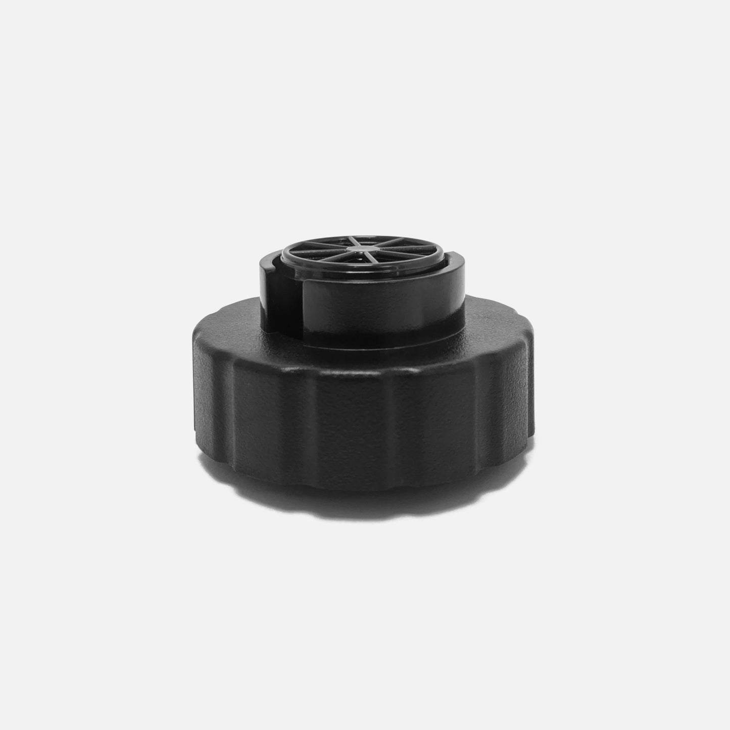 The Fridja f1200 Water Tank Cap is a black plastic replacement with a textured grip and vented circular top, shown on a plain white background.