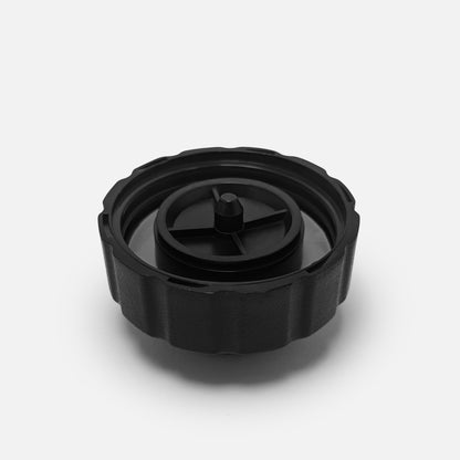 The Fridja f1200 Water Tank Cap is a black, round plastic replacement cap with a textured edge and central circle, designed for the f1200 steamer, shown on a plain light gray background.
