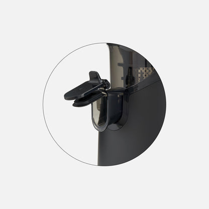 Close-up of the Fridja f2500 Anti Drip Tap’s black and transparent spout and anti-drip cap, set against a plain light gray background.