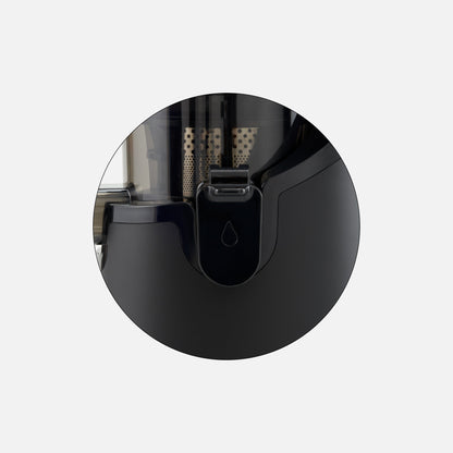 Close-up of the Fridja f2500 Anti Drip Tap, a black juicer part with a droplet symbol on the spout, shown as a possible replacement against a plain light background.