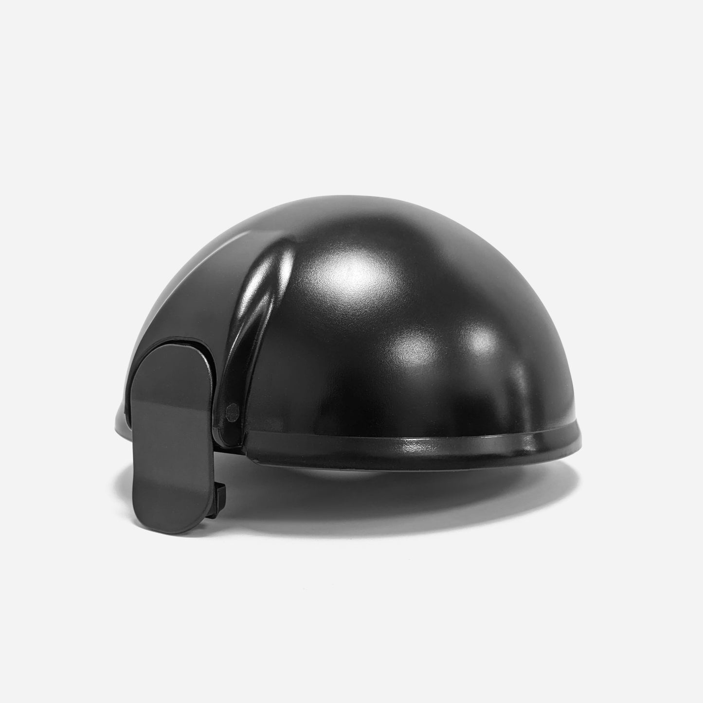 The Fridja f900 Lid, a durable black half-sphere helmet with side attachment, is shown on a white background—ideal as a replacement part for your f900 Automatic Citrus Juicer.