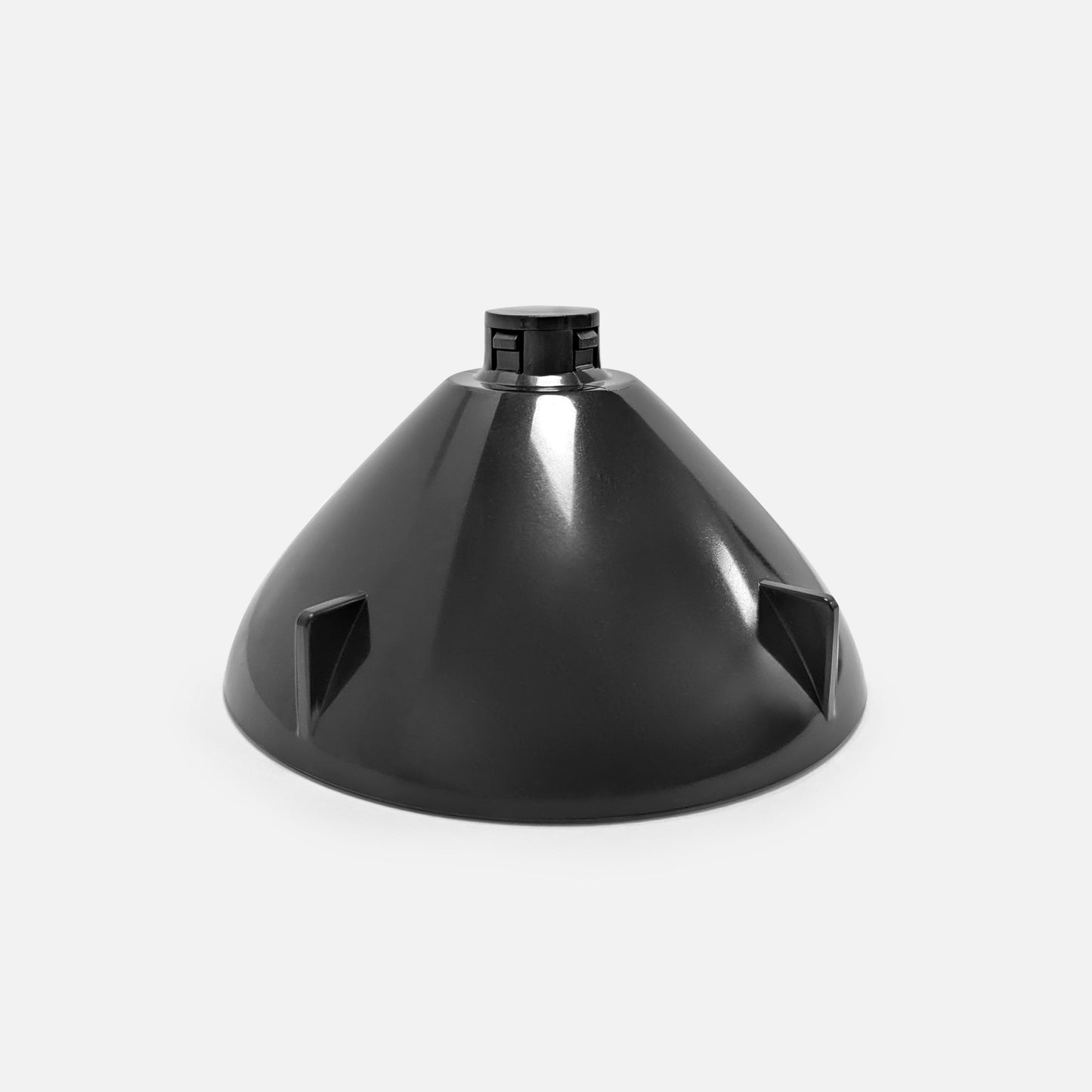 The Fridja f900 Lid Insert is a black, cone-shaped plastic part with a cylindrical top and three small triangular protrusions around its base for efficient juice extraction, photographed on a plain white background.